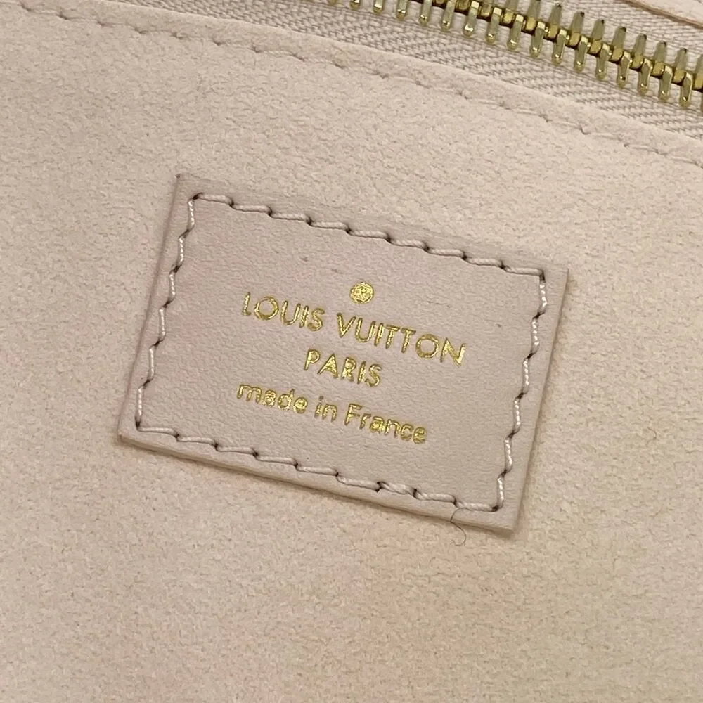 Louis Vuitton Neverfull MM Monogram Empreinte Tote Bag M47080